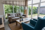 Chalet-23-woonkamer-robbenjager-texel-2024.jpg